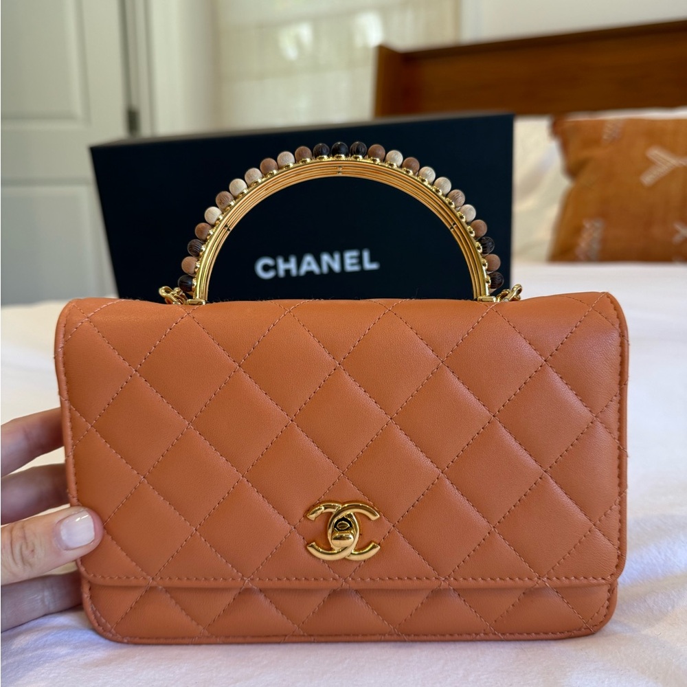 Chanel Orange Quilted Clutch with Iconic CC Closure